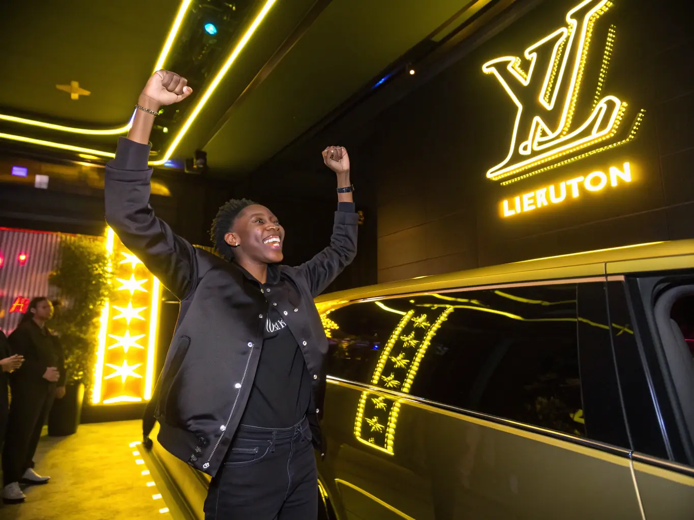 A student athlete celebrating a victory, highlighting personal achievement and the rewards of hard work.